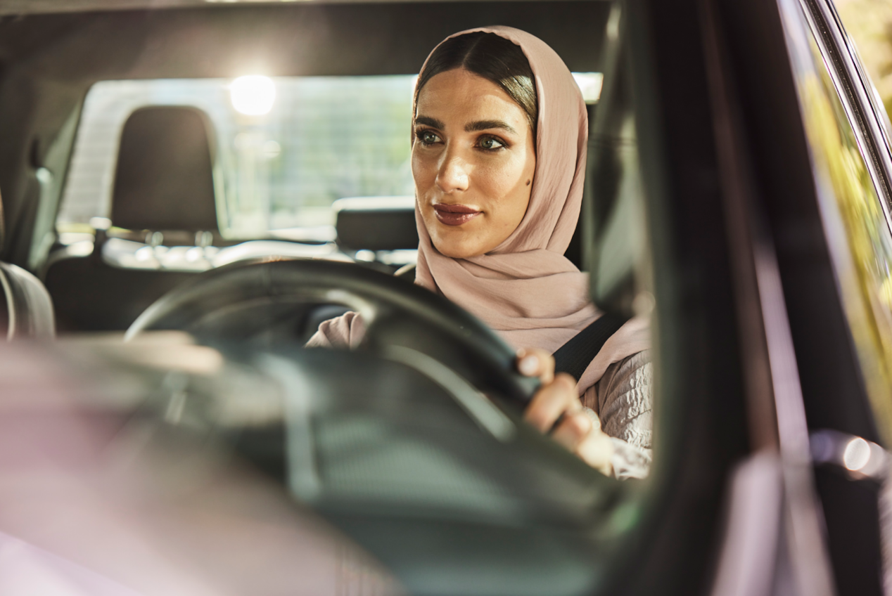 Woman with seatbelt sitting in the car