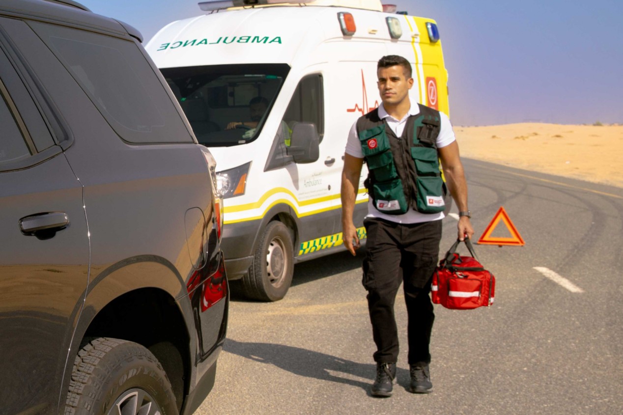 Man walking out of ambulance vehicle